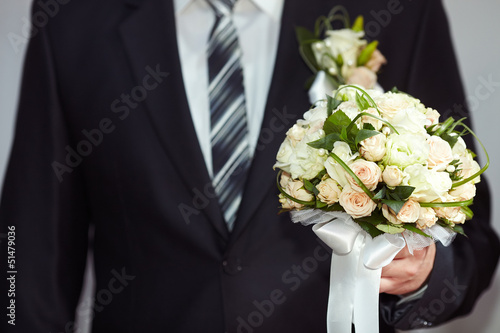 Groom with a bouquet