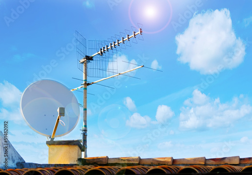 Tableau sur toile satellite antenna and sun