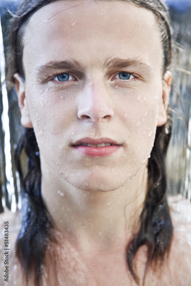 Portrait of a young man in the water