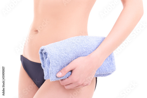 slim female body with towel © Di Studio