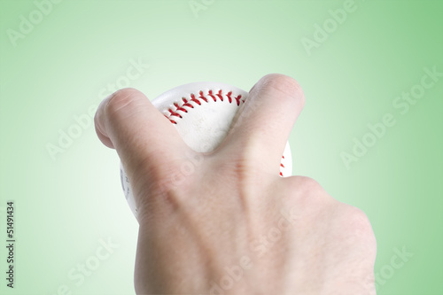 split finger baseball grip on green with clipping path