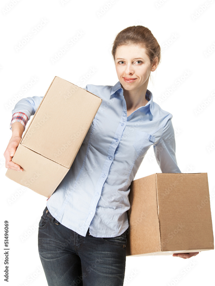 Smiling woman carrying two big boxes Smiling woman carrying two big boxes