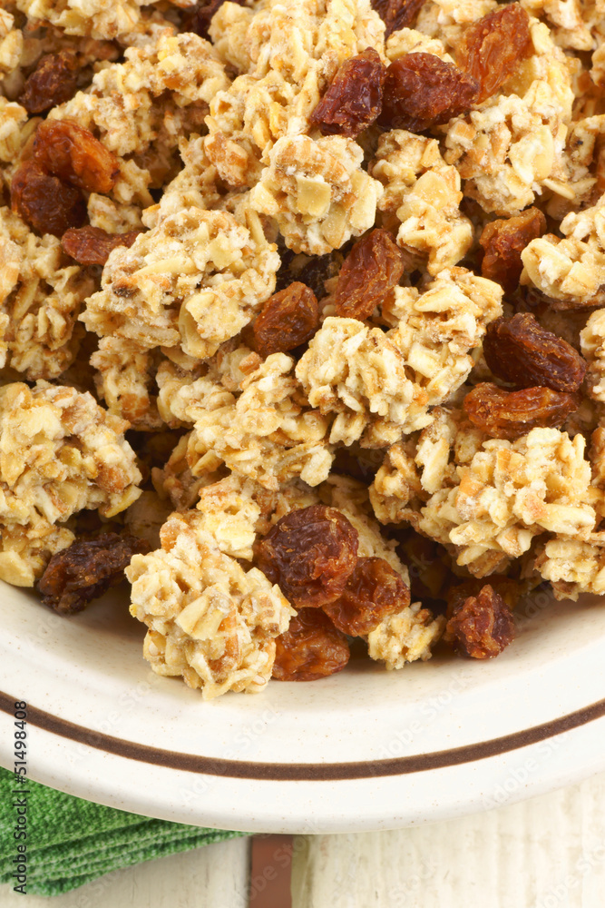 Crunchy oat clusters with raisins closeup Crunchy oat clusters with raisins closeup