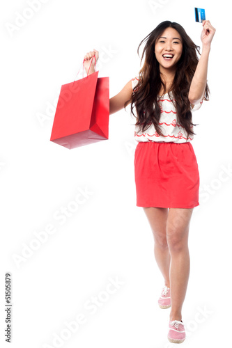 Let's go shopping. Cheerful young girl.