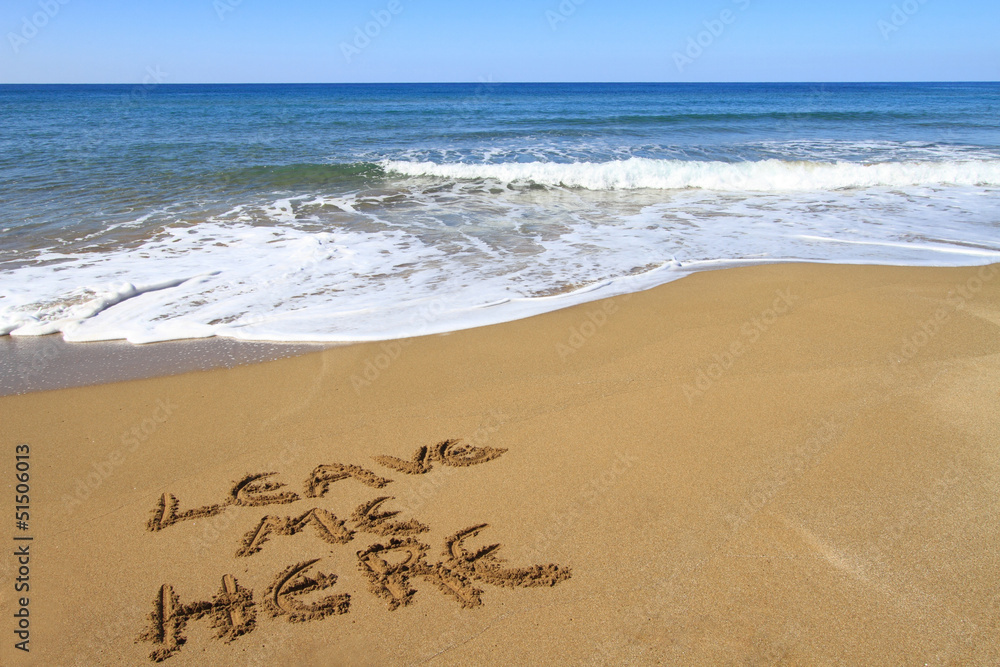 Leave me here written on golden sandy beach Leave me here written on golden sandy beach