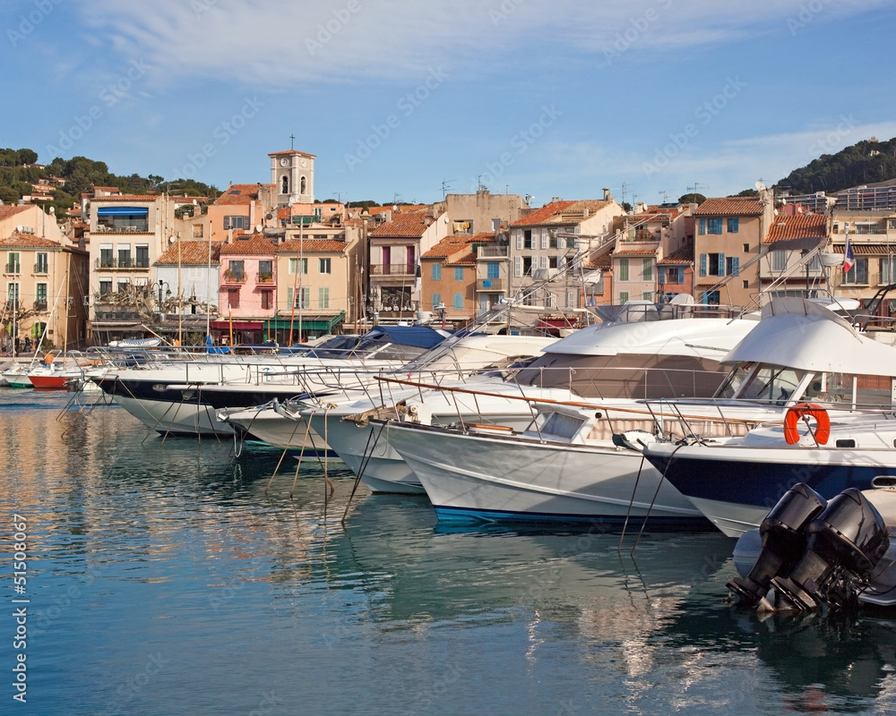 mooring for motor boats in Cassis and view of the city