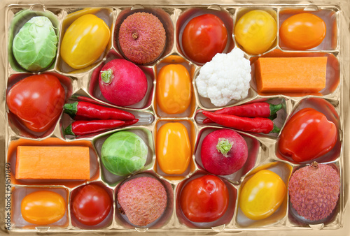 Chocolate box with vegetable and fruits - humorous
