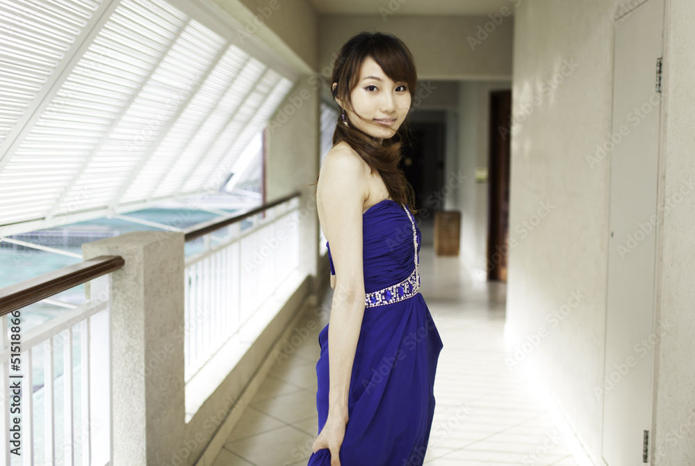 Pretty Chinese girl with blue full dress Pretty Chinese girl with blue full dress