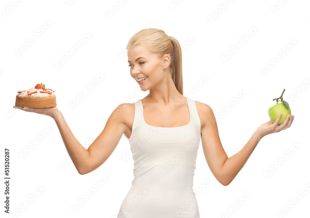 sporty woman with apple and cake sporty woman with apple and cake