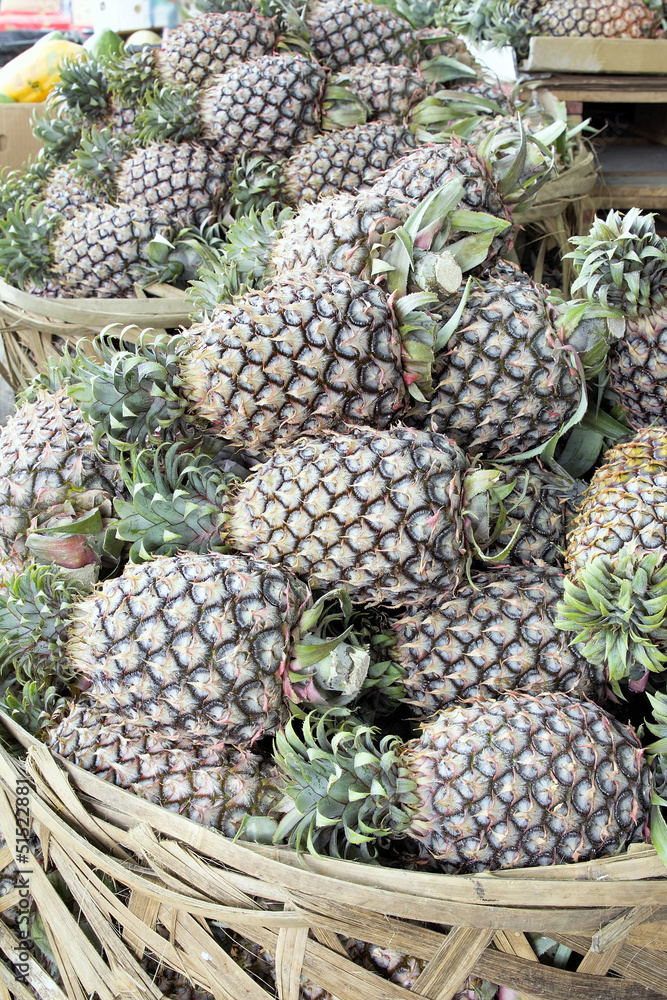 Pineapples Piled in Basket Closeup