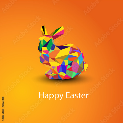 Origami Easter rabbit card at orange background