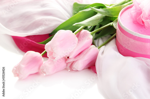 Beautiful bouquet of pink tulips and gift
