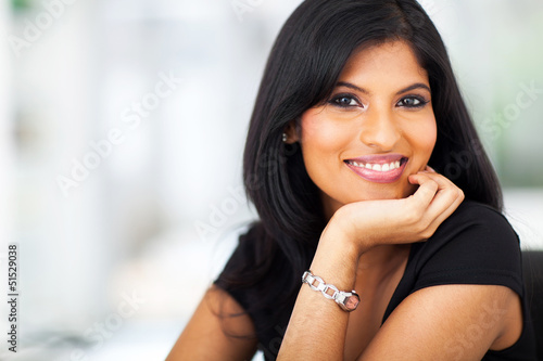 portrait of hispanic smiling businesswoman photo