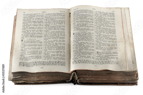 old open Russian bible isolated on white background