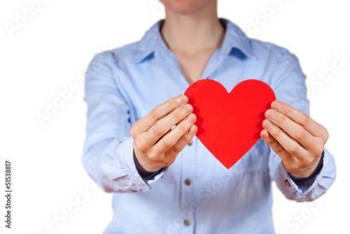 person holding a heart