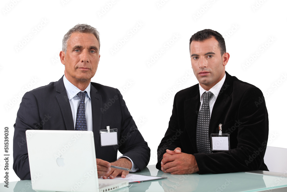 Two businessman at work. Two businessman at work.