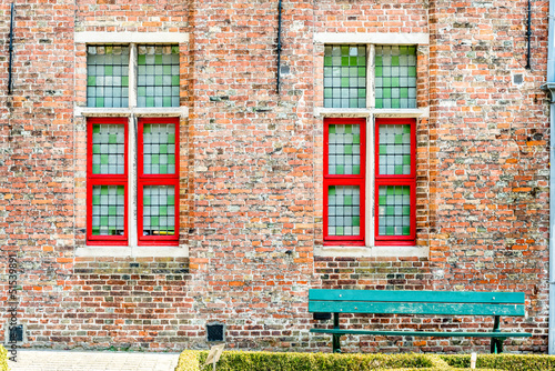 Windows and a bench in Brugge, Belgium © elvistudio
