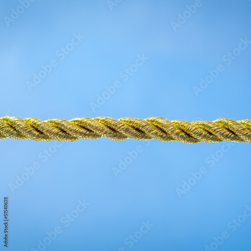 Gold rope on blue