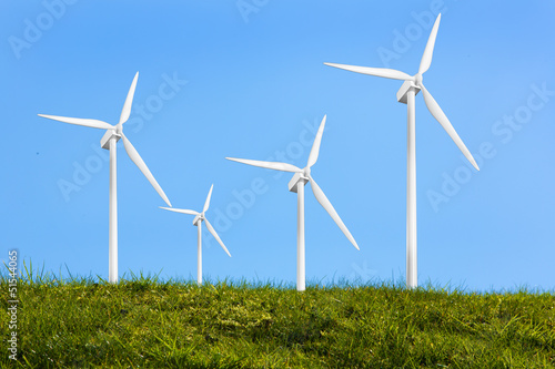 Four turbines on the grass © WavebreakmediaMicro