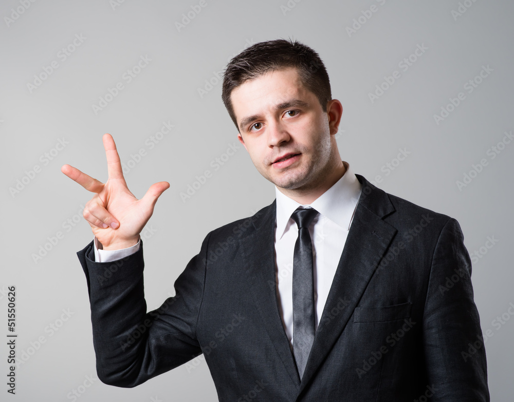 business man showing two fingers or victory gesture business man showing two fingers or victory gesture