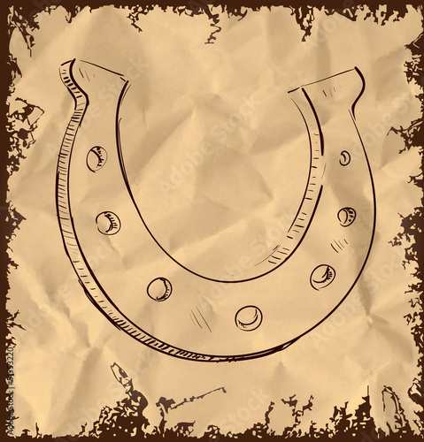 Lucky horseshoe isolated on vintage background