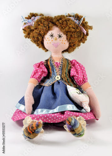 Fotografie rag doll with red hair