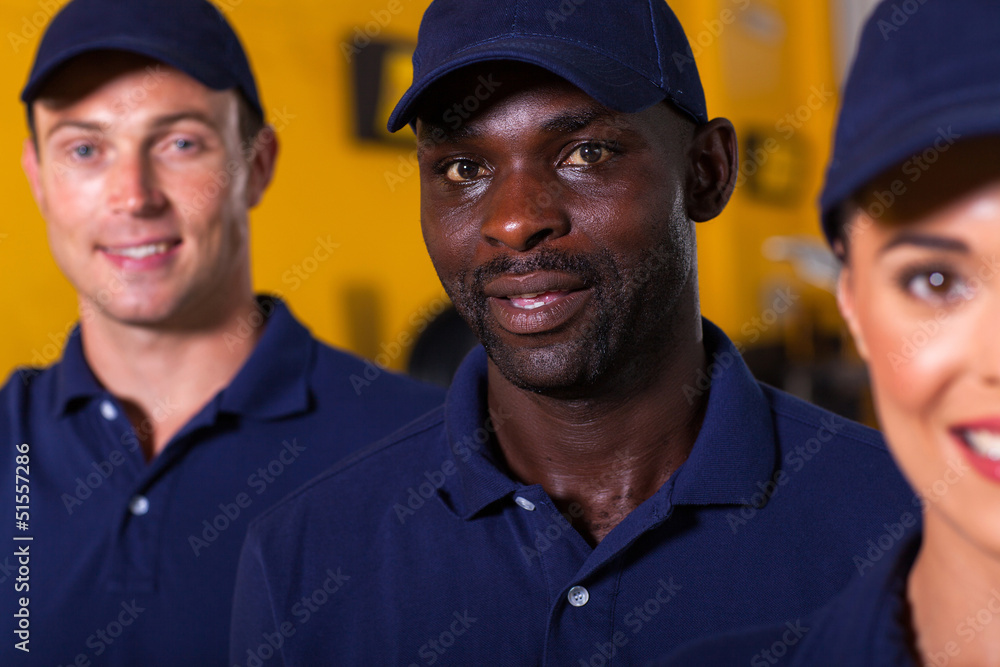 afro american auto technician with colleagues afro american auto technician with colleagues
