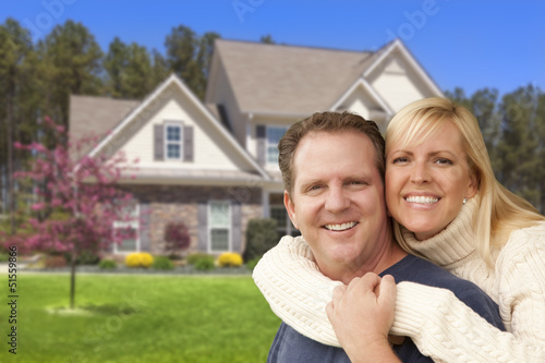 Happy Couple Hugging in Fro...