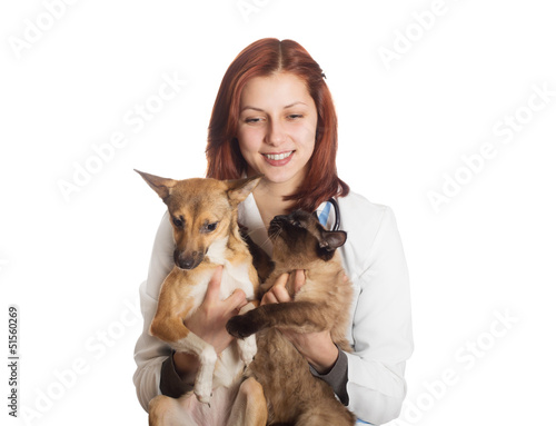 veterinarian with pets in the hands