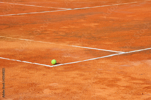 Tennis ball on a tennis clay court © tigger11th