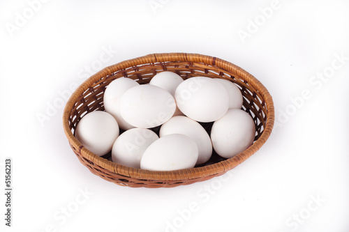 white eggs in a basket