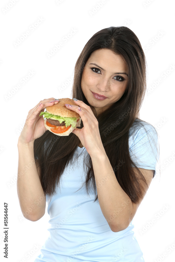 Model Released. Woman Eating Homemade Beefburger Model Released. Woman Eating Homemade Beefburger