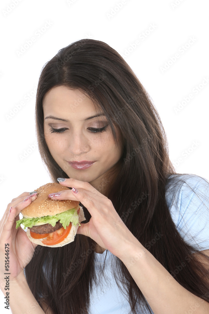Model Released. Woman Eating Homemade Beefburger