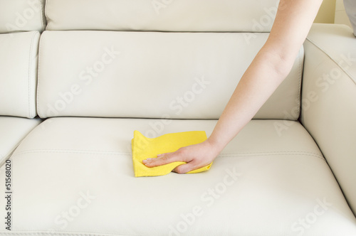 cleaning a beige sofa photo