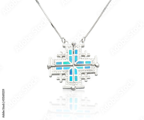 silver necklace decorated by turquoise in islamic symbol shape