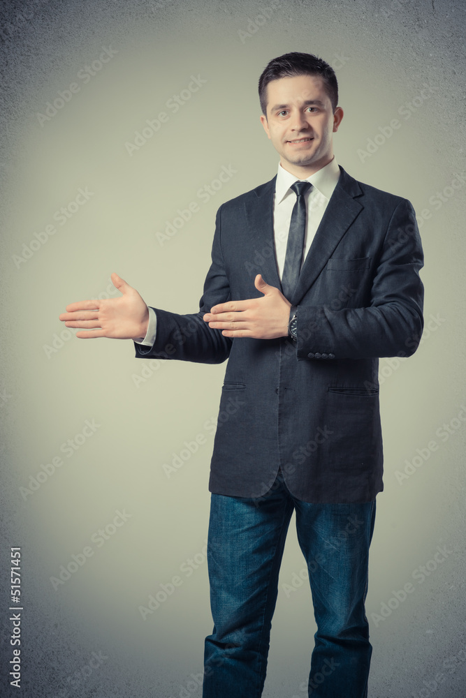 Businessman holding something in his hands Businessman holding something in his hands