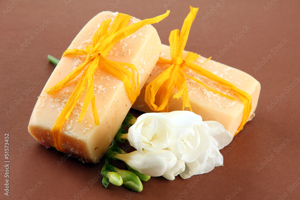 Natural handmade soap, on brown background Natural handmade soap, on brown background