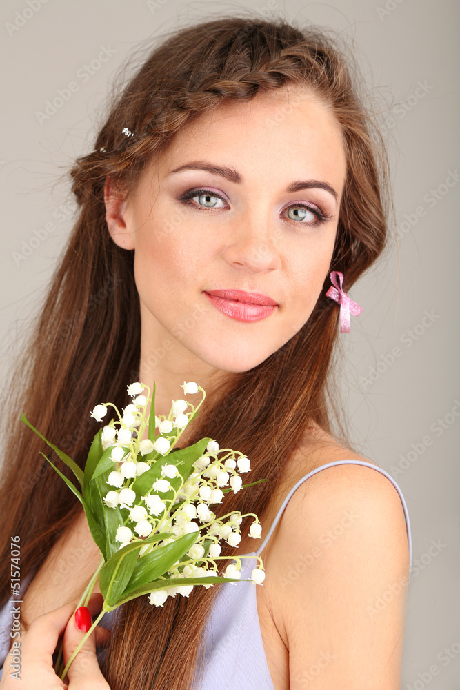 Young woman with beautiful hairstyle and flowers, Young woman with beautiful hairstyle and flowers,