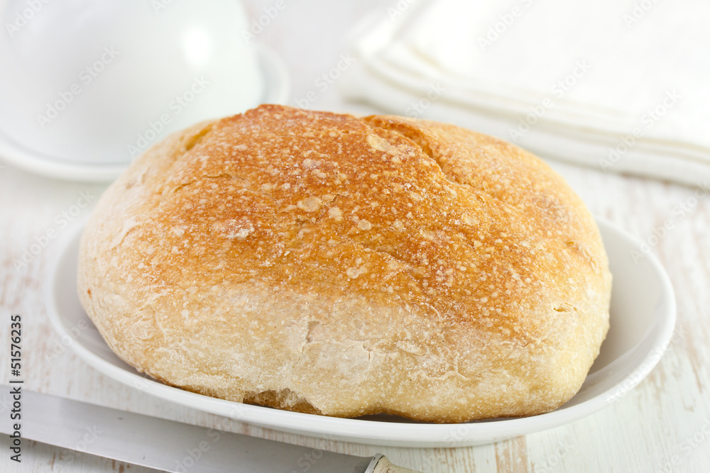 bread on white dish bread on white dish