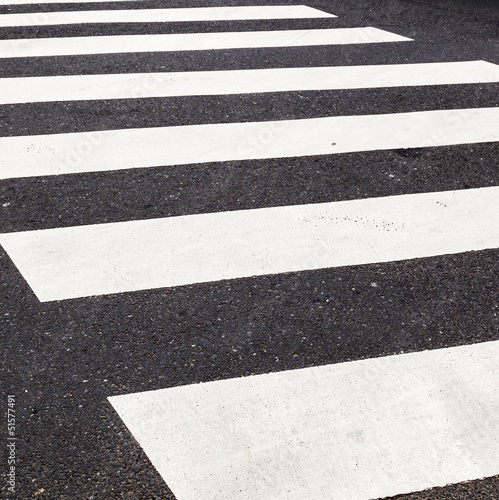 pedestrian crossing marked with white paint