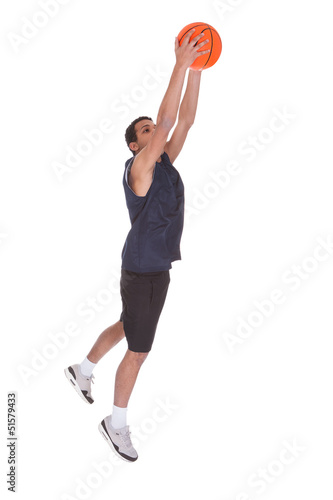 Basketball Sportsman Doing Slam Dank © Andrey Popov