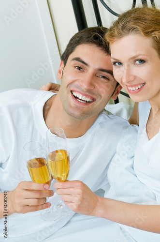 Cheerful couple with champagne