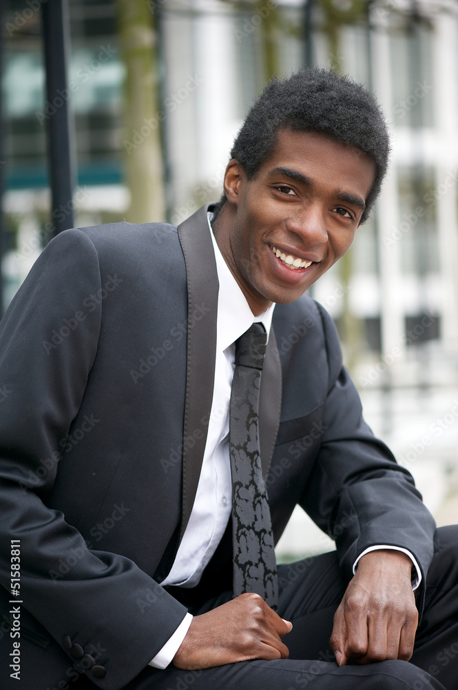 Handsome young african american businessman smiling