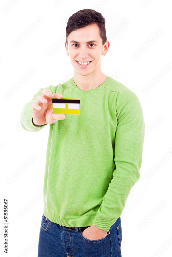 Young casual man with credit card on white background Young casual man with credit card on white background
