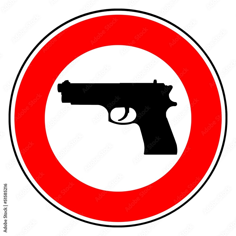 Arme à feu dans un panneau de signalisation Arme à feu dans un panneau de signalisation