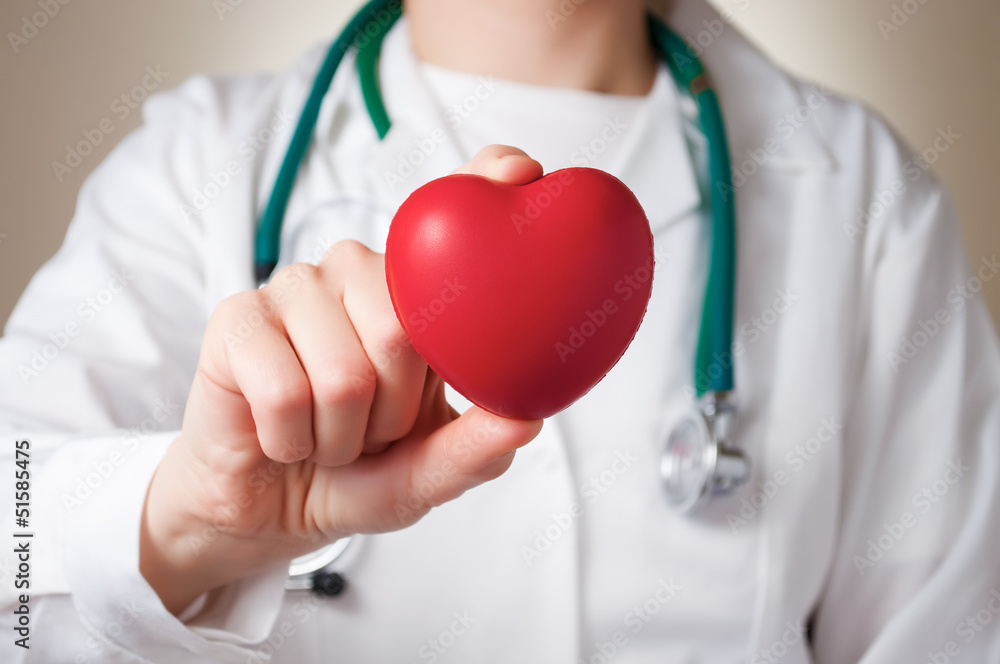 Heart in doctor's hand Heart in doctor's hand