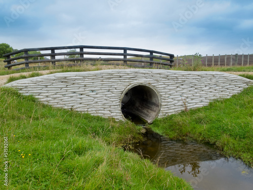 Fotografie Storm culvert drainage pipe concrete revetment