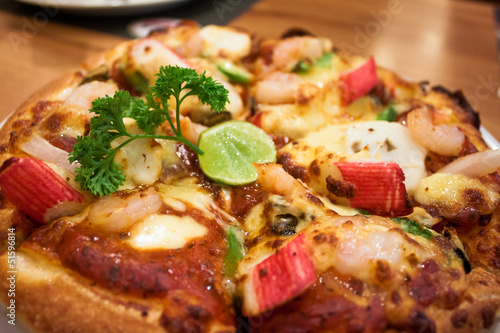 Delicious pizza with seafood