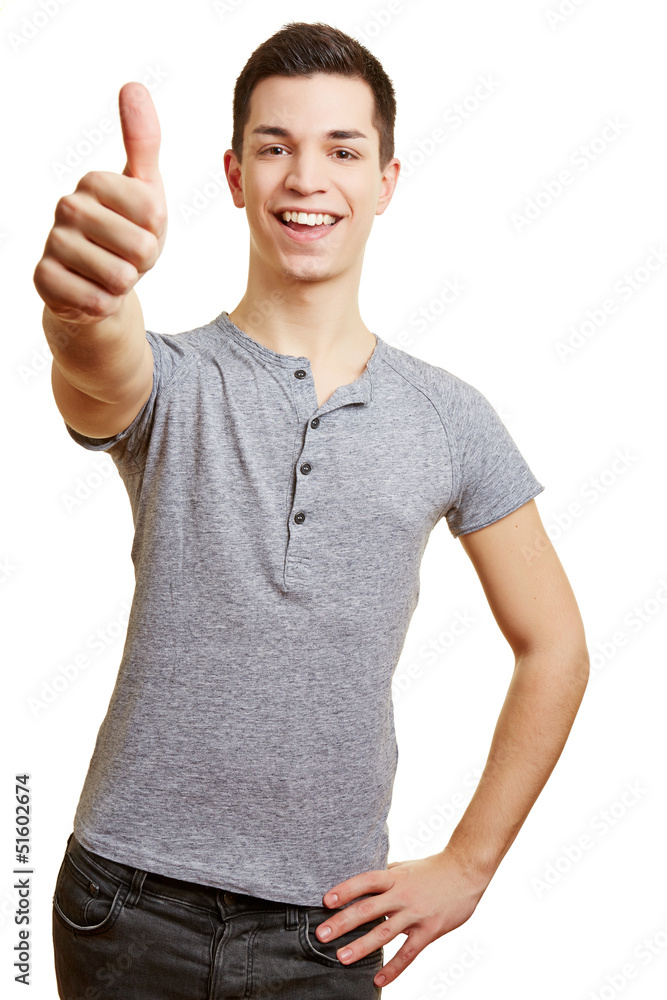 Junger Mann hält seinen Daumen hoch Stock Photo | Adobe Stock