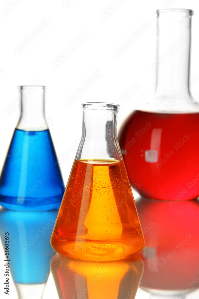Test tubes with colorful liquids isolated on white Test tubes with colorful liquids isolated on white